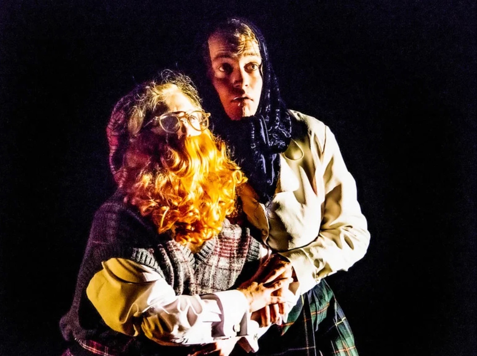 The crofter and his wife, lit in hard white light